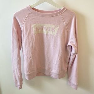Light Pink Levis sweater, very comfortable. fits women and kids as well.